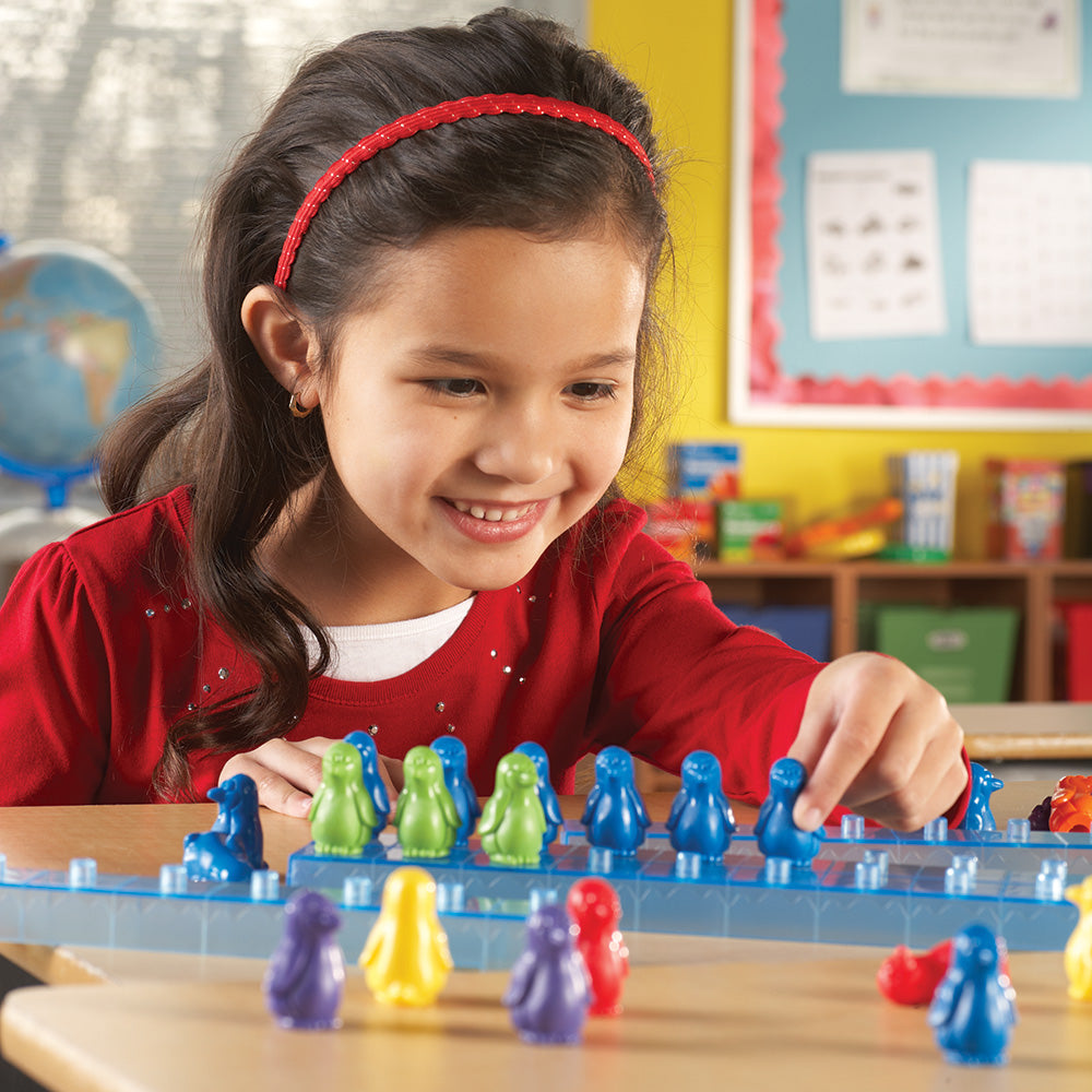 Learning Resources Penguins on Ice Math Activity Set, Hands-On Counting and Sorting Game for Kids, Includes 100 Colourful Penguin Counters and 10 Ice Bars